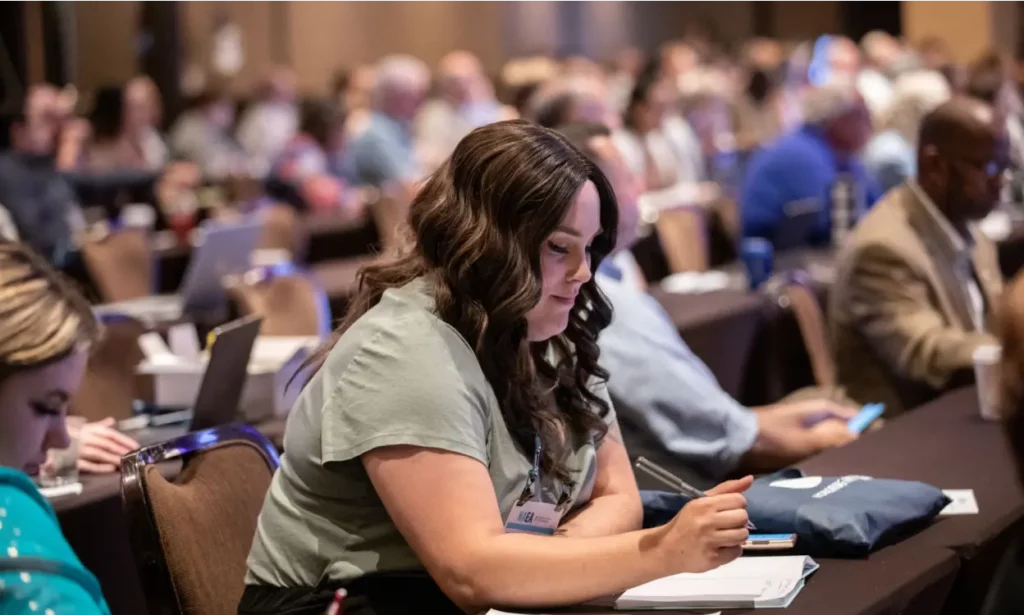 RESIZED Affiliate Postcard - Woman in Session 1 for current NTPI fellows